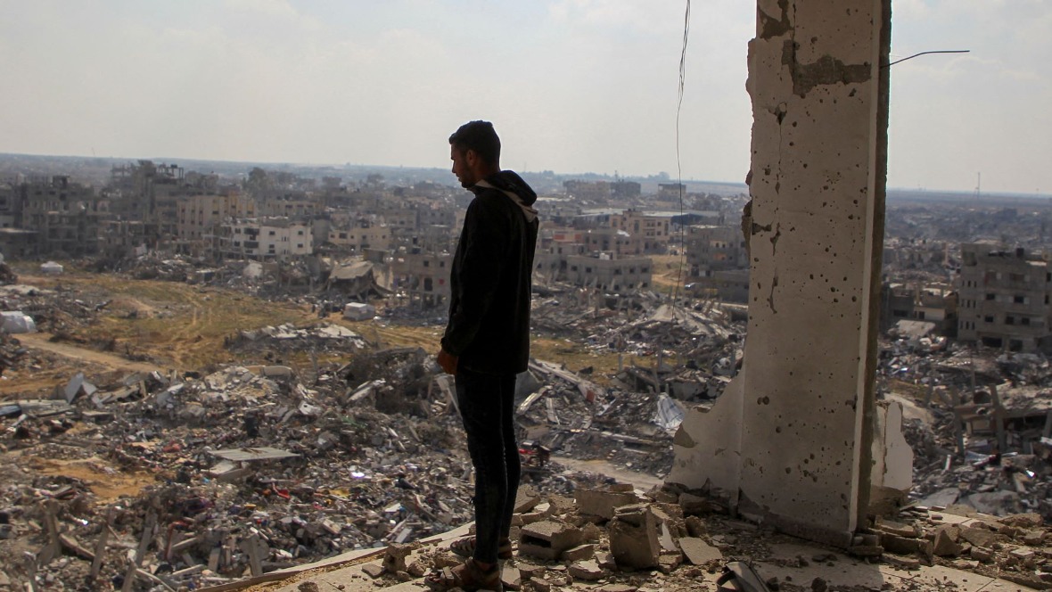 A Palestinian man views the rubble of buildings destroyed during the Israeli offensive, amid a ceasefire between Israel and Hamas, in Rafah in the southern Gaza Strip February 4, 2025. 