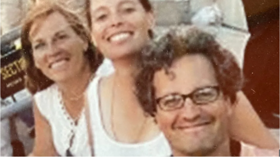 Marc Fogel with family members, smiling, in photograph taken before his arrest in Russia.