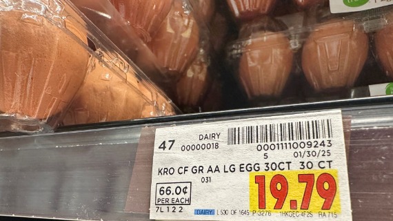 Trays of eggs with the price of 66 cents each.